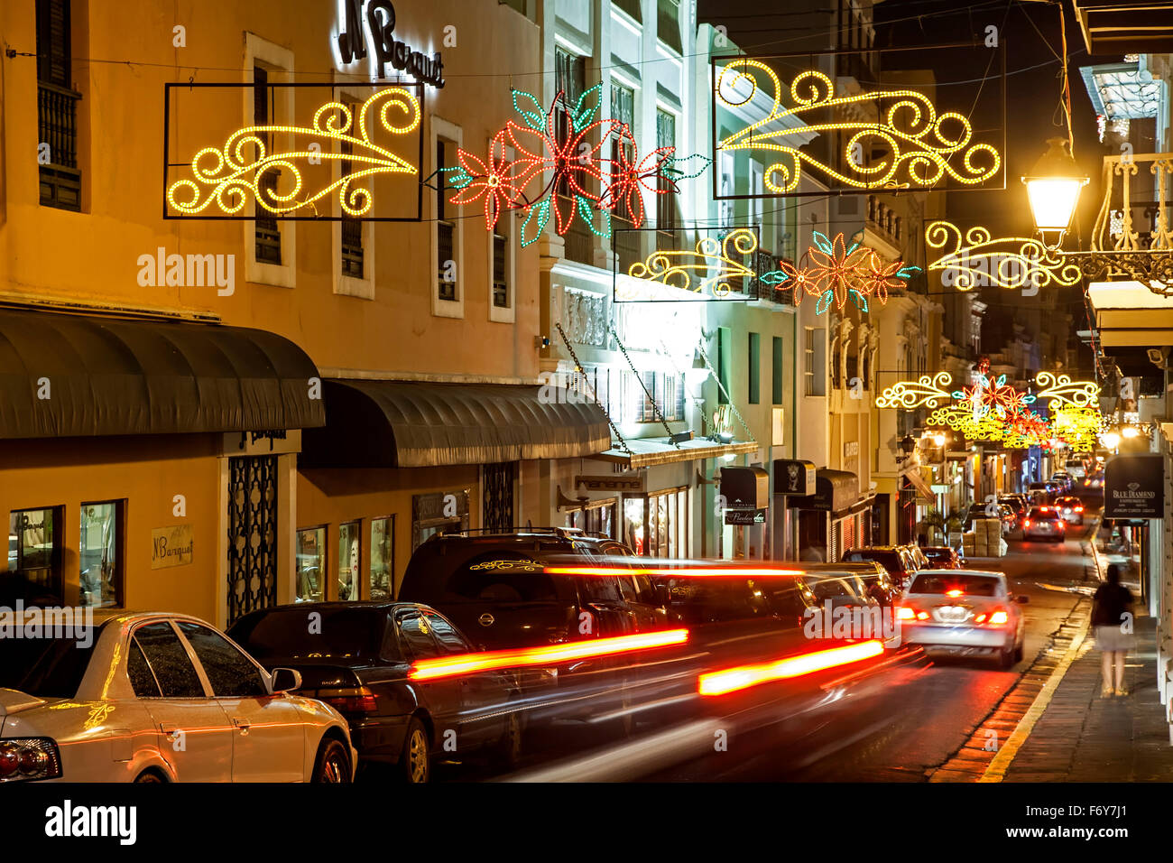 Street decorated for Christmas and streaking car lights, Old San Juan