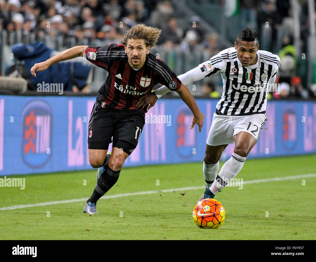 Turin, Italy. 21st Nov, 2015. Alessio Cerci (left) and Alex Sandro Lobo Silva (right) fight for the ball during the Serie A match between Juventus FC and AC Milan. Credit:  Nicolò Campo/Pacific Press/Alamy Live News Stock Photo