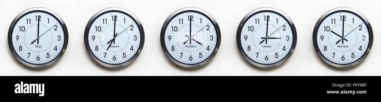 clock on the wall of time zones for trading around the world set at 3PM  london GMT time Stock Photo - Alamy