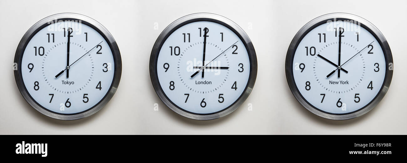 clock on the wall of time zones for trading around the world set at 3PM