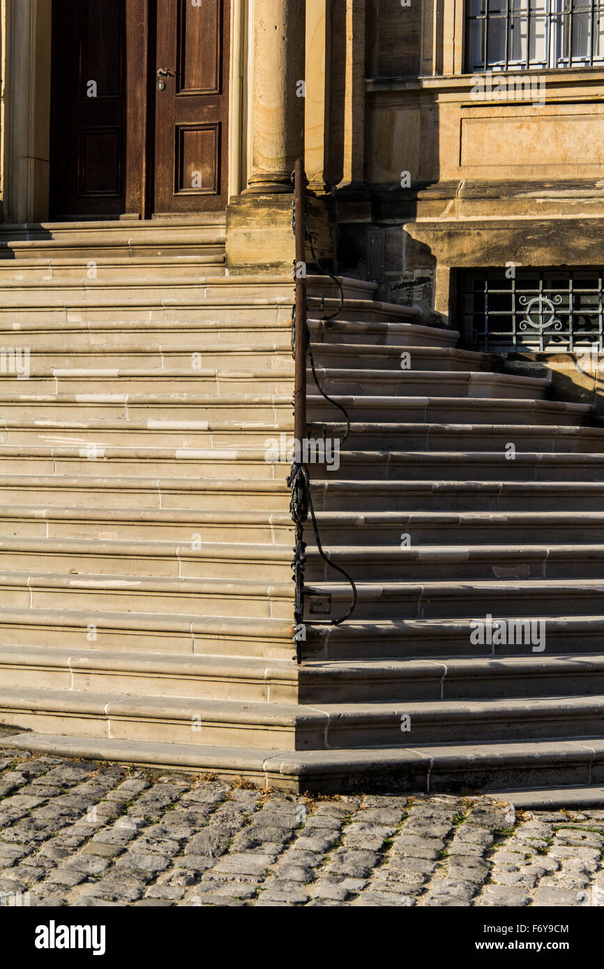 Stairs cut by the sun light and shadows Stock Photo