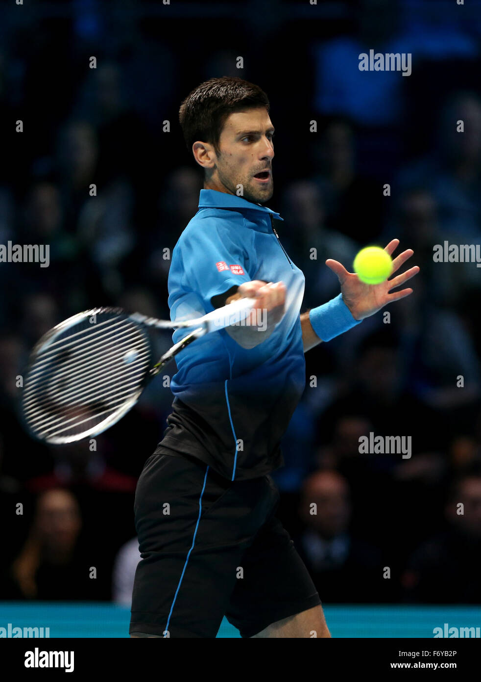 London, Britain. 21st Nov, 2015. Novak Djokovic of Serbia hits a return ...