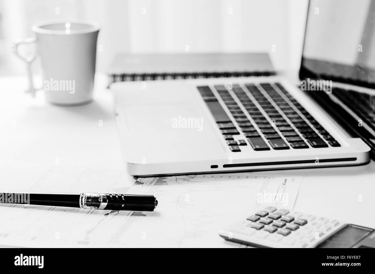 Notebook Computers ,book,pen on desk Stock Photo Alamy