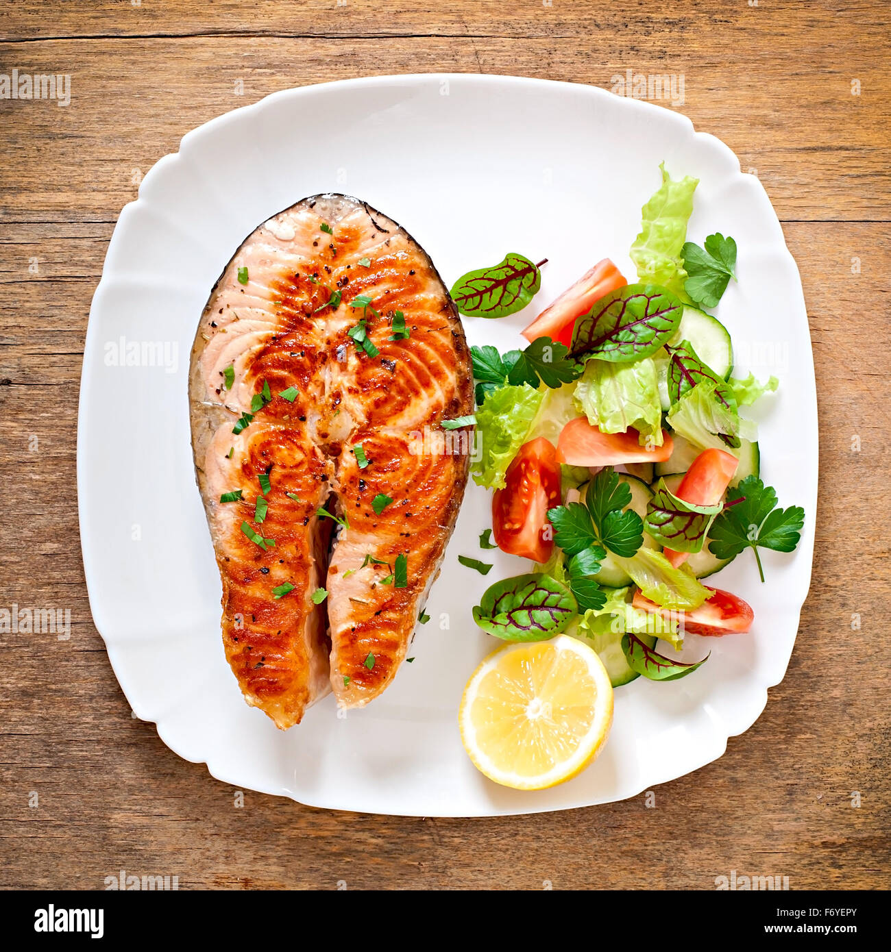 Grilled salmon with salad Stock Photo - Alamy