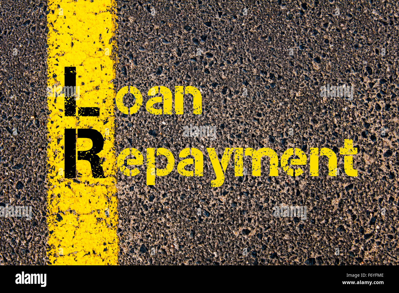 Concept image of Business Acronym LR as Loan Repayment written over road marking yellow paint line. Stock Photo