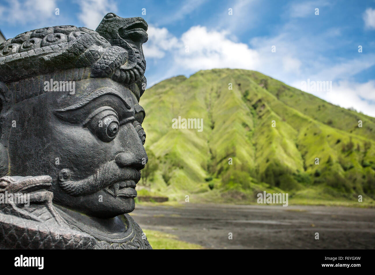 Stone sculpture on entrance of Bentar Candi and Batok volcano in Bromo Tengger Semeru National Park, East Java, Indonesia Stock Photo