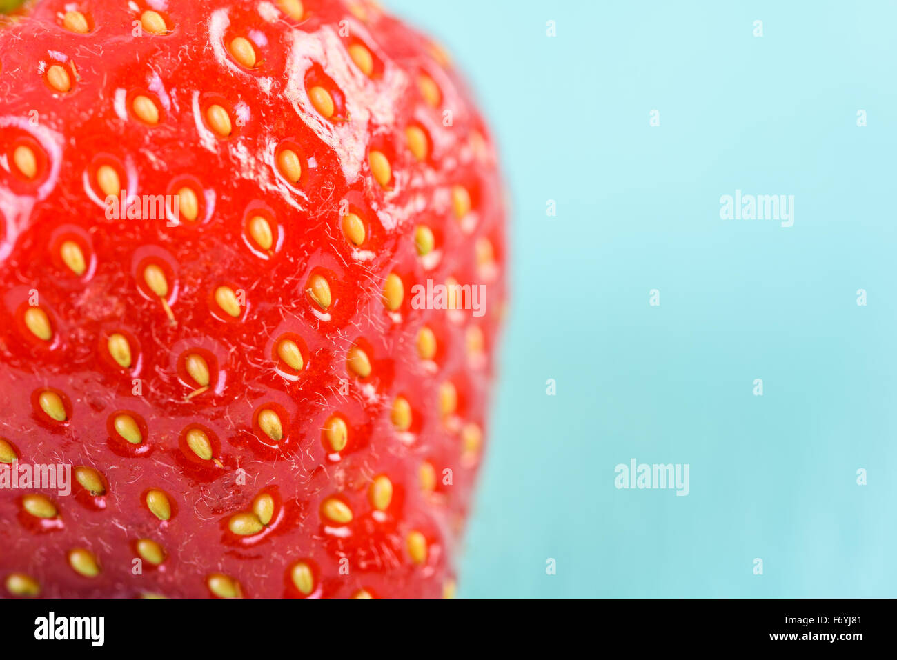 Fresh Red Strawberry On Blue Wood Boards Background Stock Photo - Alamy