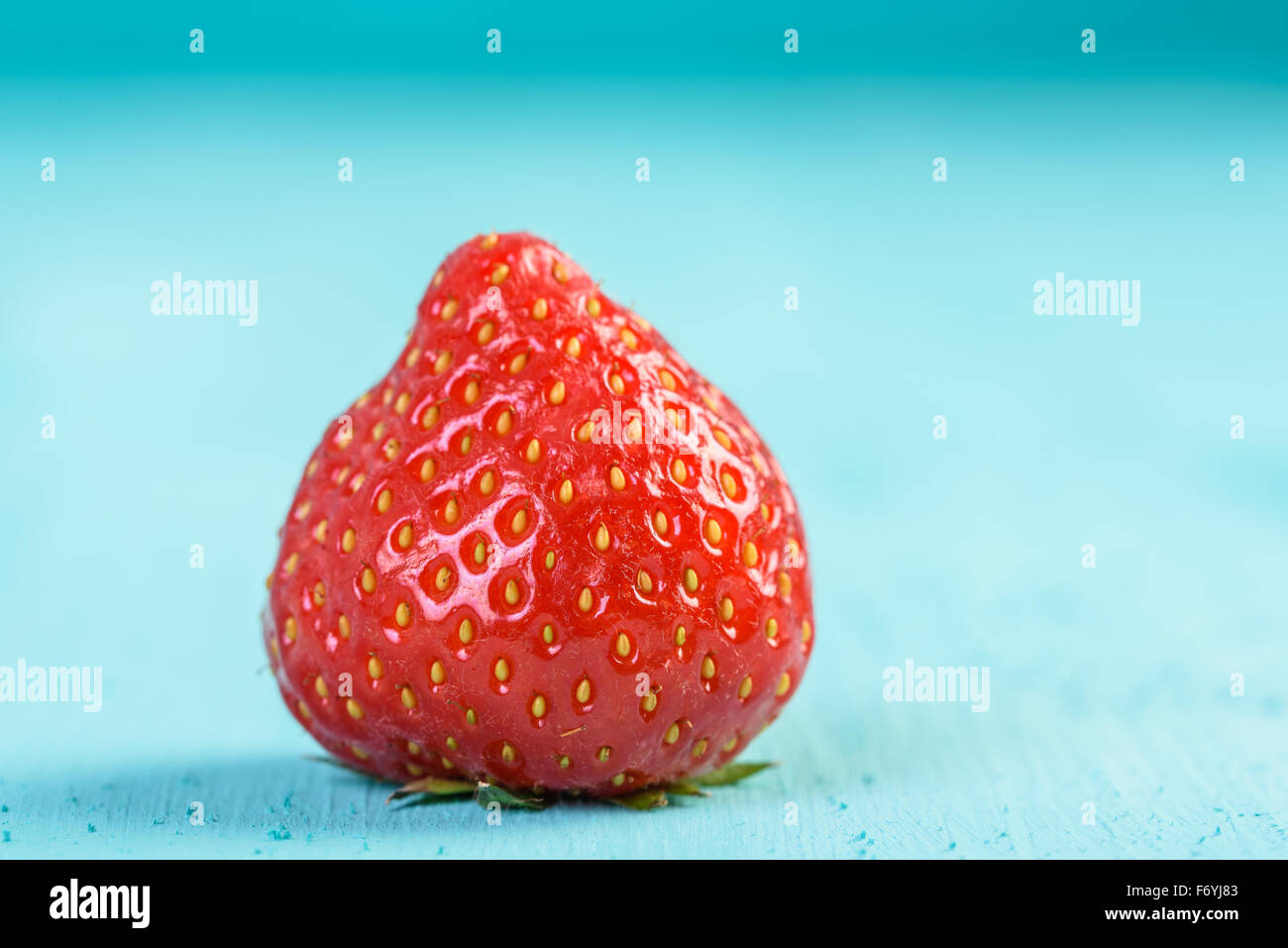 Fresh Red Strawberry On Blue Wood Boards Background Stock Photo - Alamy