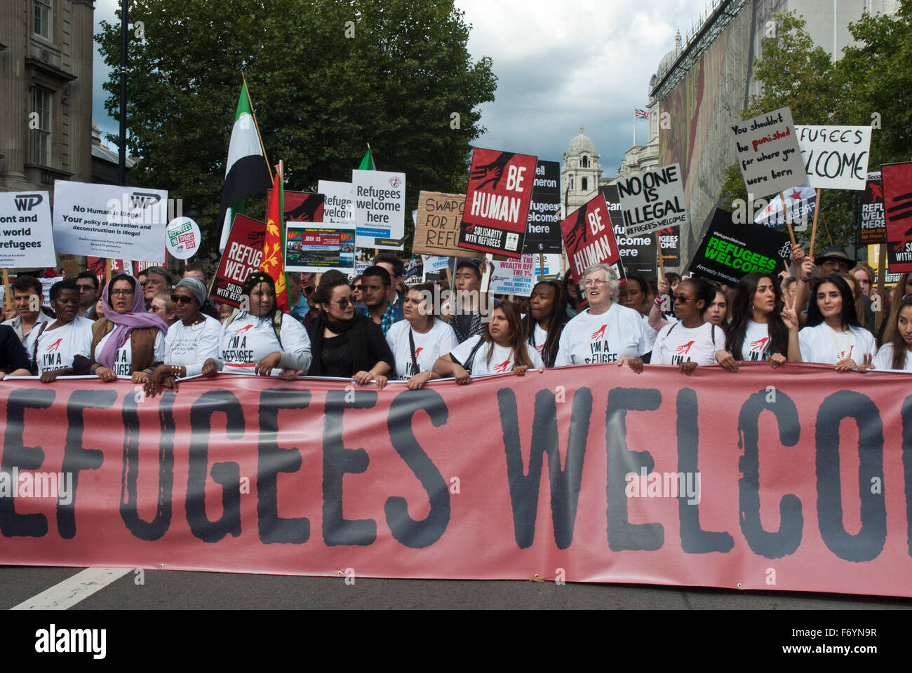 'Refugees welcome here' demonstration. Poster/ banner 'Refugees are Welcome Here' Stock Photo