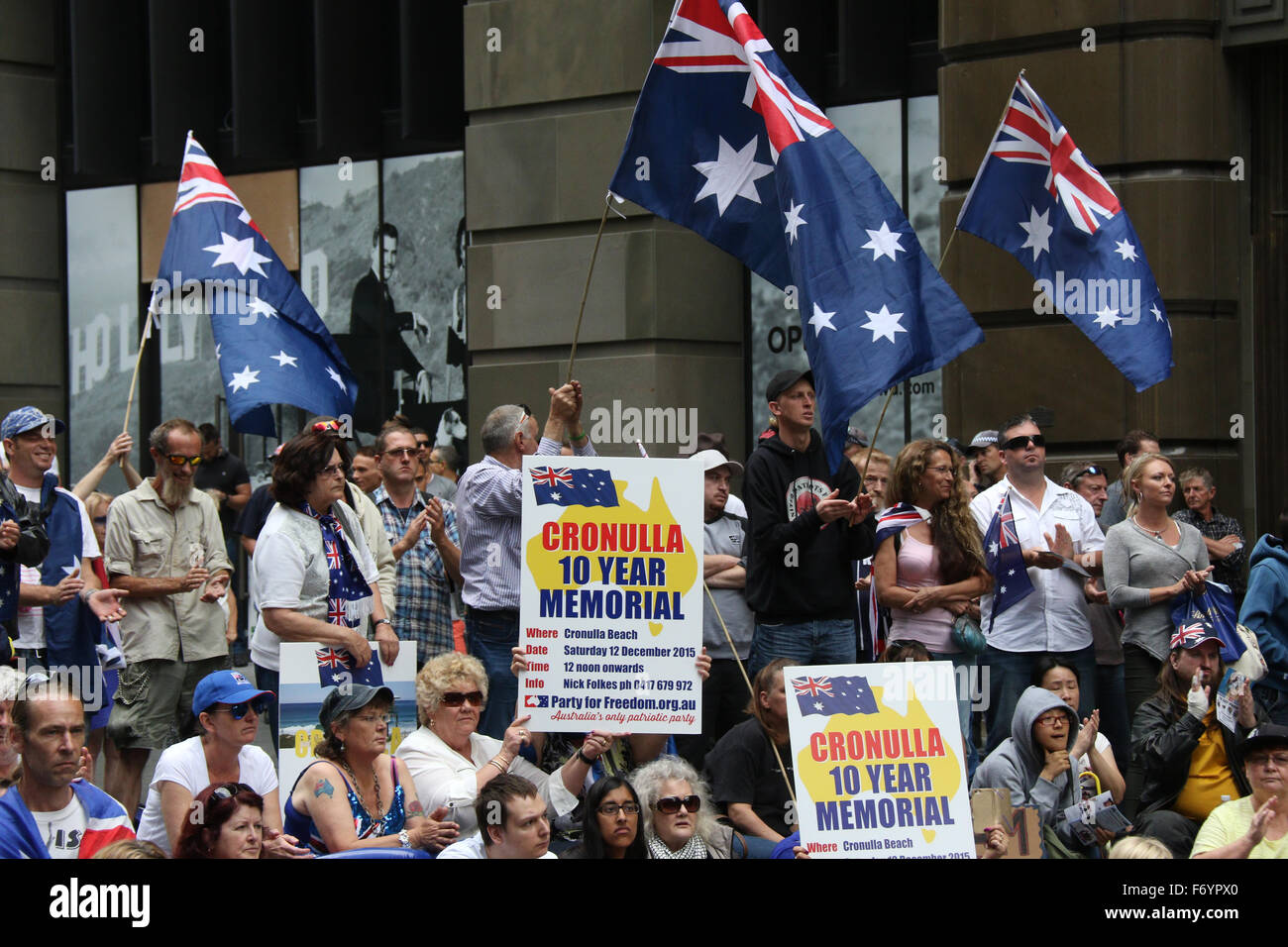 Sydney, Australia. 22nd November 2015. Pictured: Some protesters hold signs promoting the 10 year Cronulla memorial, which takes place on the anniversary of the Cronulla riots uprising. A few hundred people rallied at the amphitheatre in Martin Place, Sydney as part of a day of rallies across the nation in support of the Australia way of life and against the Islamification of Australia and the threat of terrorism, particularly after the Sydney siege. Credit:  Richard Milnes/Alamy Live News Stock Photo
