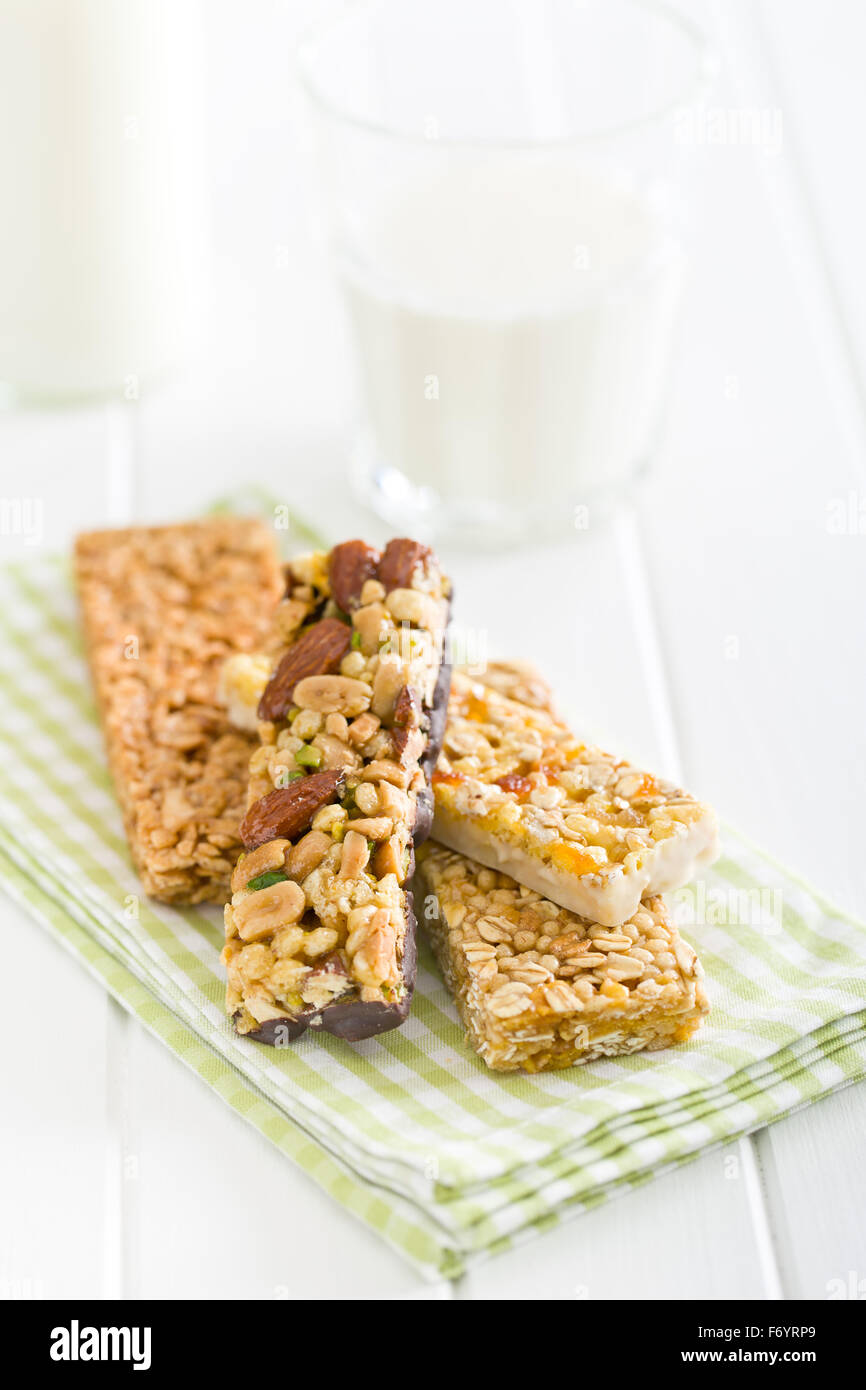 muesli bar and milk on kitchen table Stock Photo Alamy