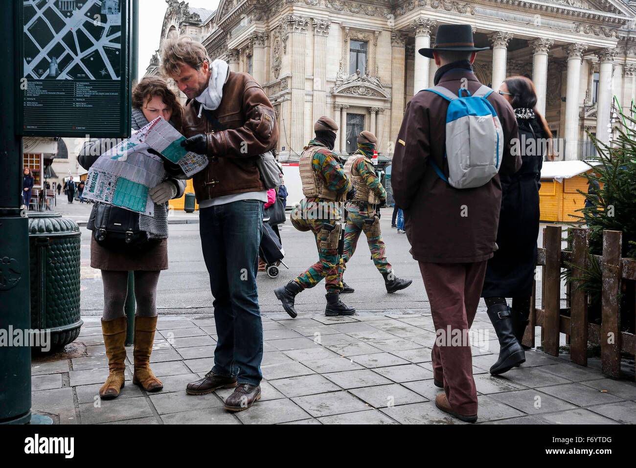 Brussels, Belgium. 22nd November, 2015. Belgian soldiers patrol in central Brussels, capital of Belgium, on Nov. 22, 2015. The terror threat level in the Brussels region was increased to 'maximum' as authorities received information on the risk of an attack 'similar to Paris.' The terror threat currently facing Belgium is 'broader than Salah Abdeslam alone', the country's interior minister Jan Jambon said in a TV interview late Saturday. (Xinhua/Zhou Lei) Credit:  Xinhua/Alamy Live News Stock Photo