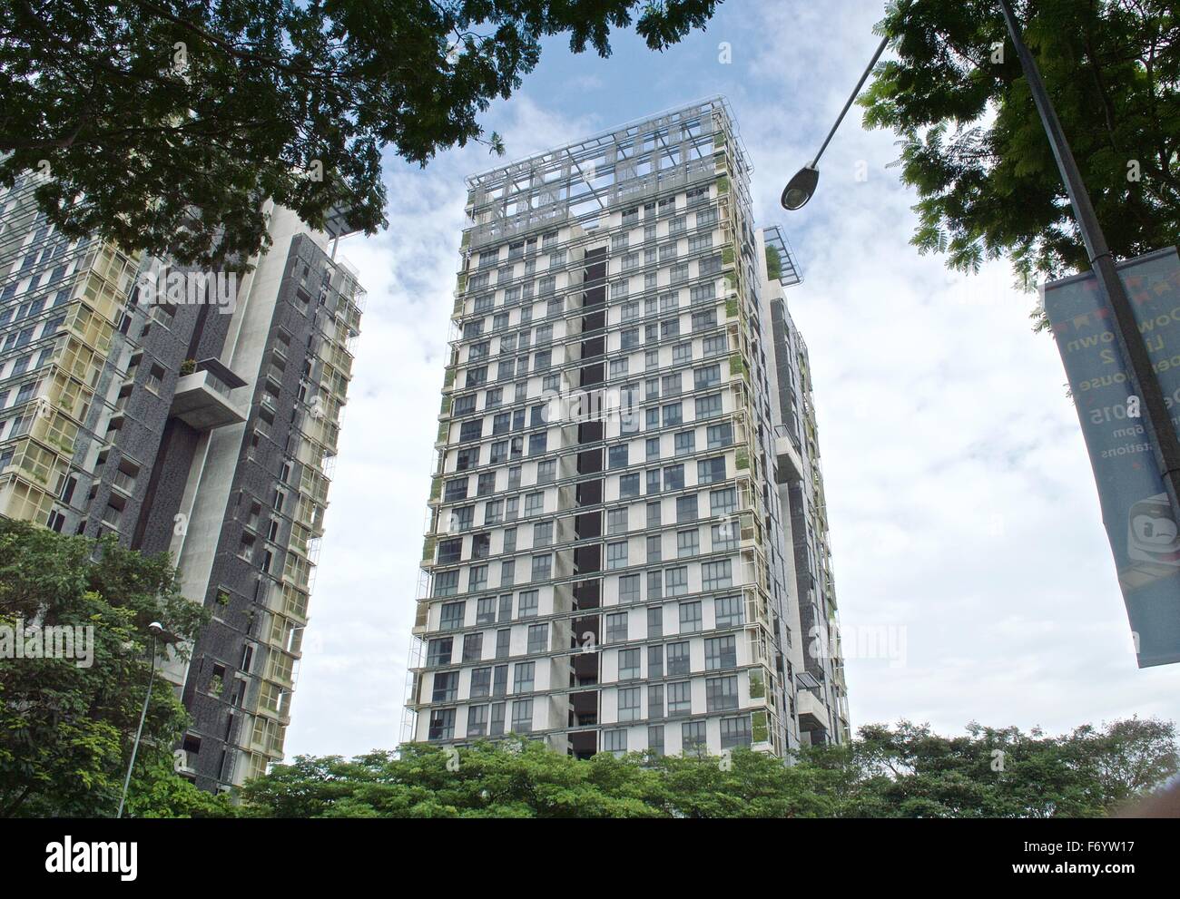 Image showcasing Modern green technology building in singpaore with blue sky background ...