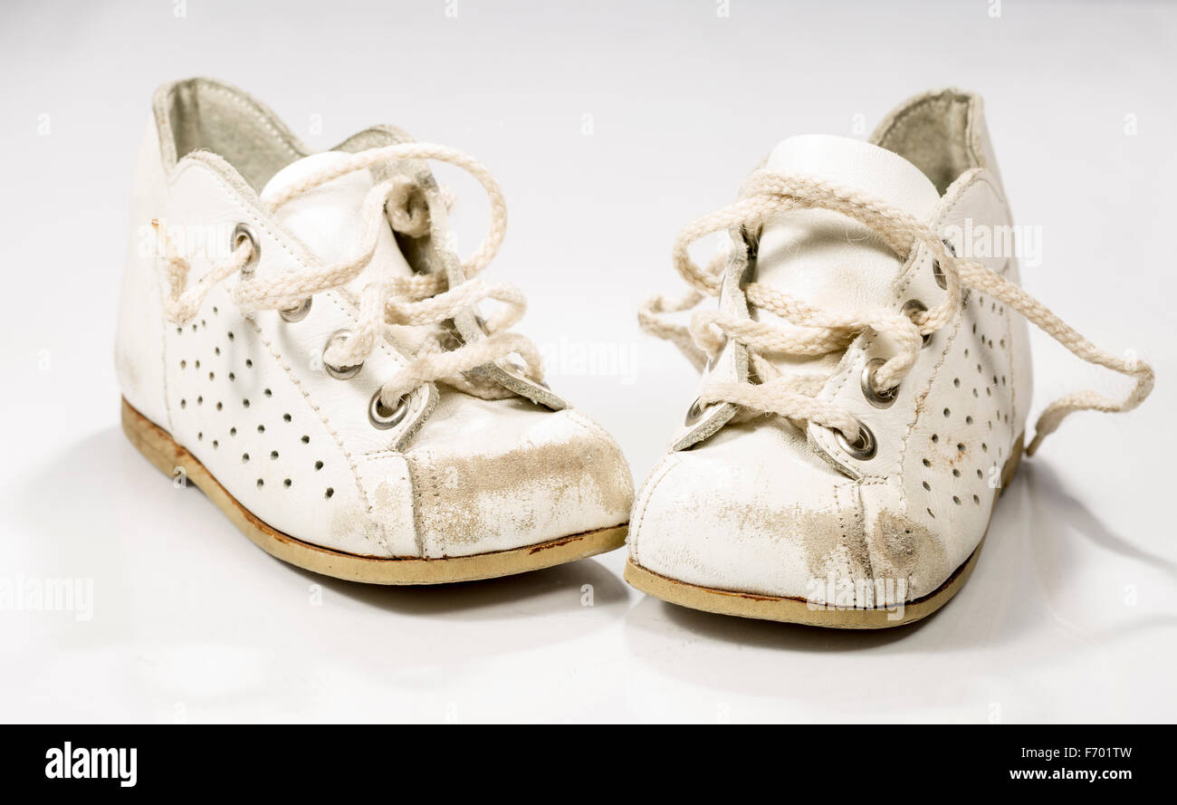 Old worn kids shoes hi-res stock photography and images - Alamy