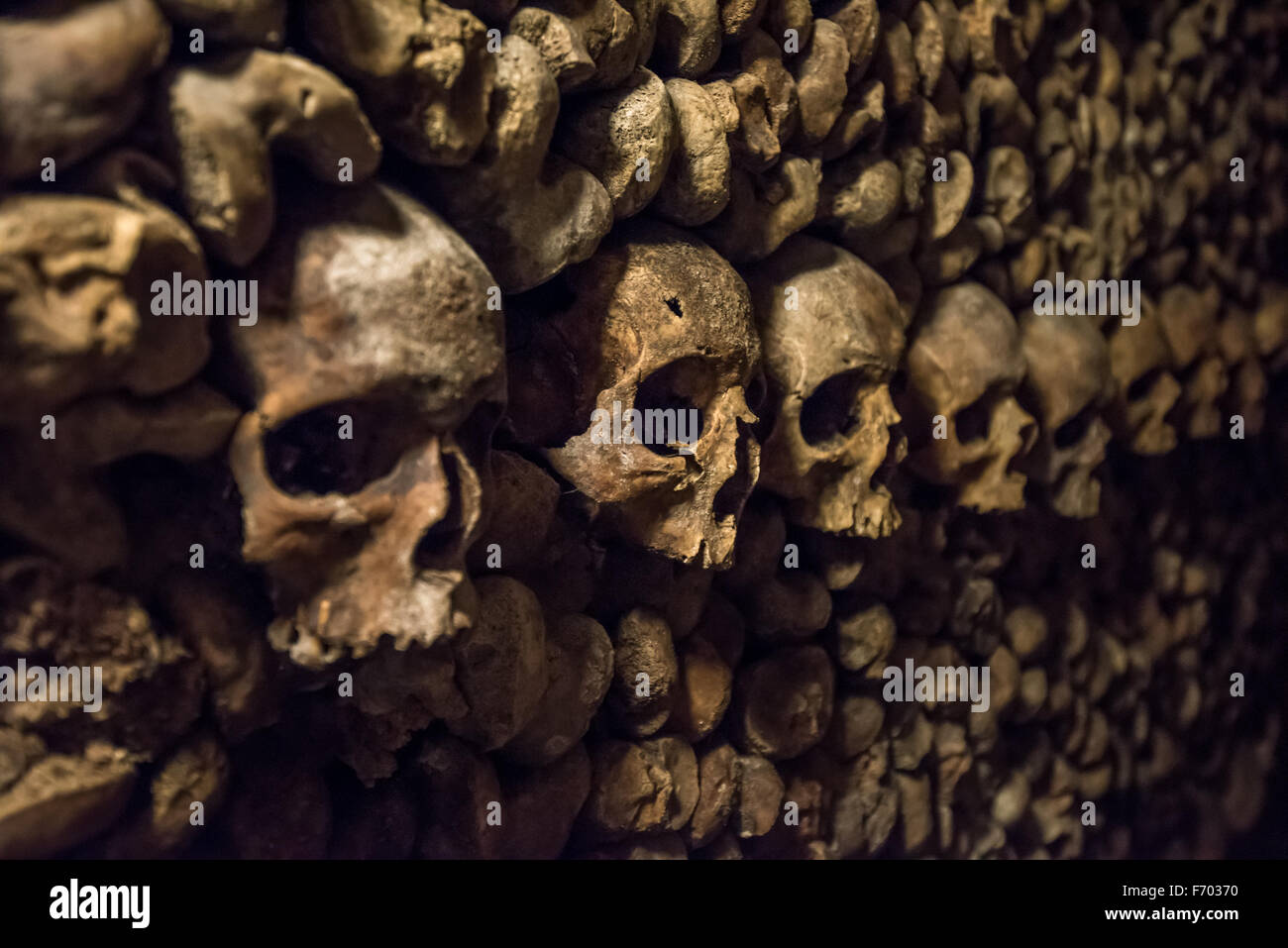 Skulls and bones in Paris Catacombs Stock Photo