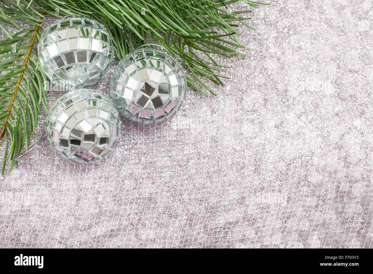 Christmas decoration and fir tree on sparkling background. Celebrating Christmas Stock Photo