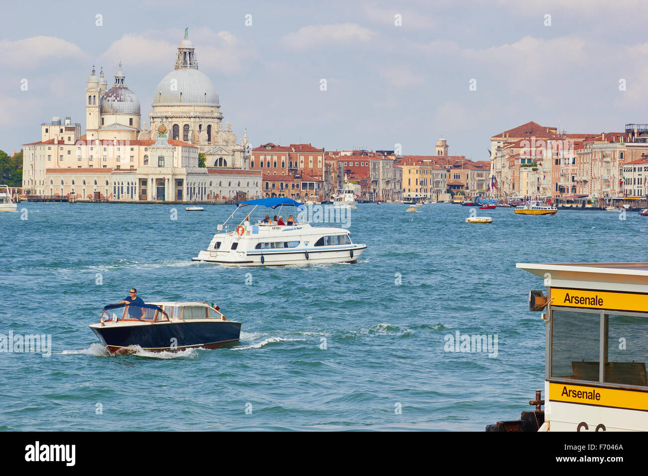 Arsenale vaporetto stop with Basilica Di Santa Maria Della Salute and Grand Canal in background Venice Veneto Italy Europe Stock Photo