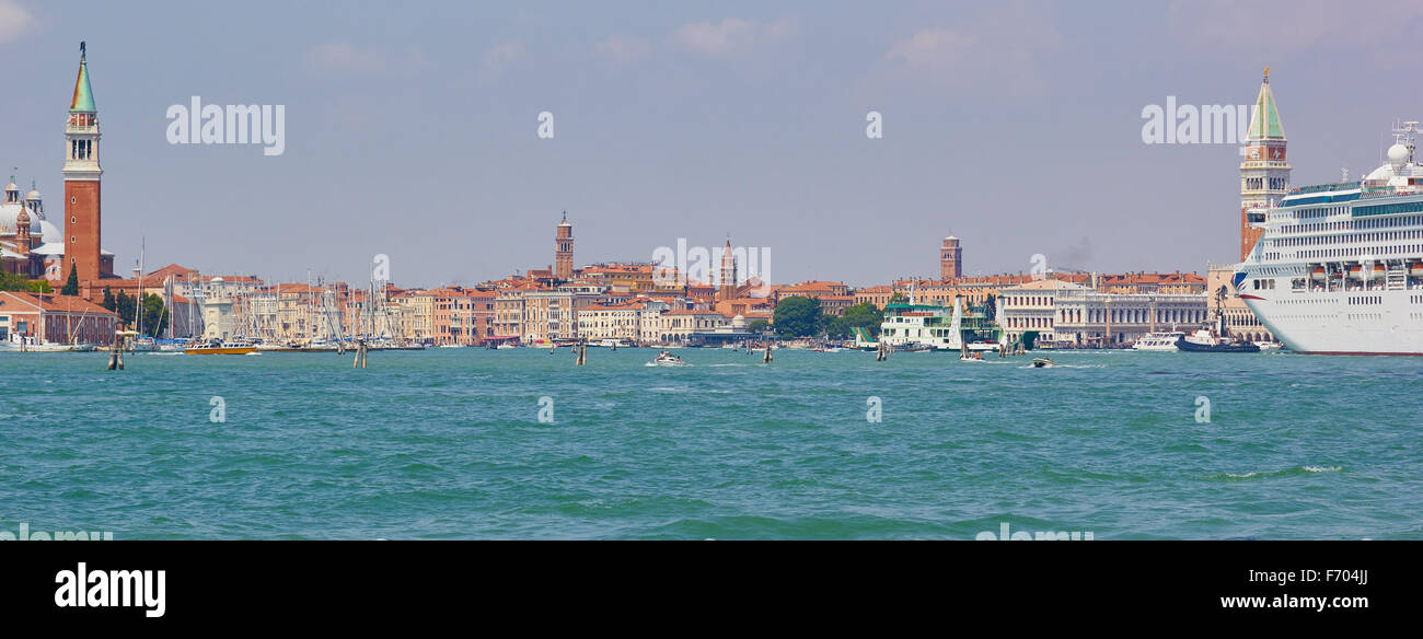 Giant cruise liner passing St Mark's campanile Venice Veneto Italy Europe Stock Photo