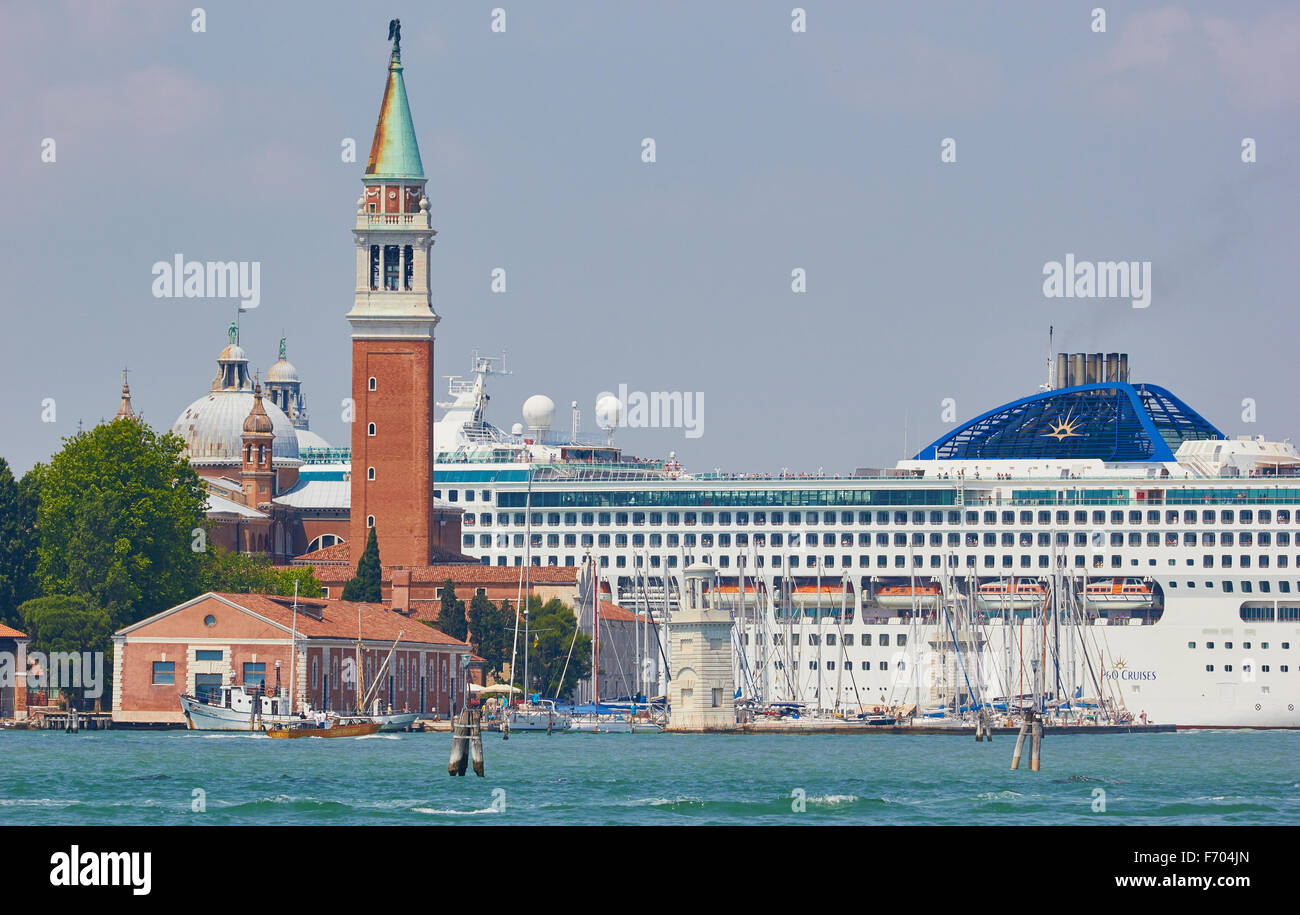 Huge cruise liner passing San Giorgio Maggiore island and Basilica Venice Veneto Italy Europe Stock Photo