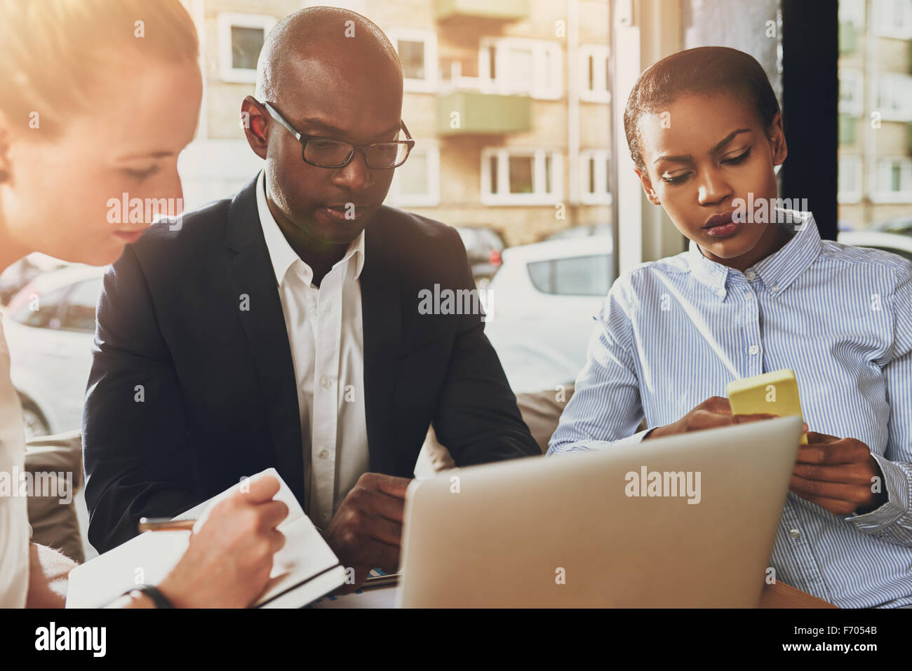 Business partners working, multi ethnic group of people, small office Stock Photo