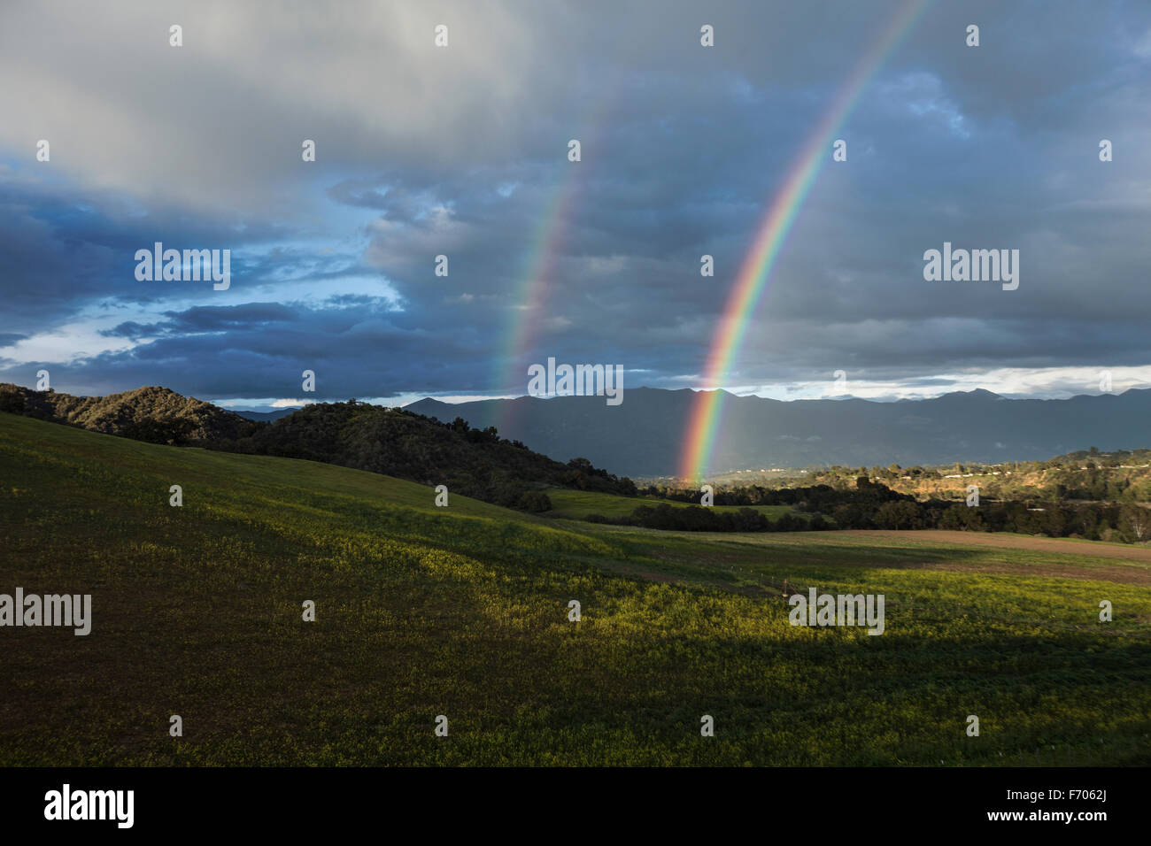 Oak View, California, USA, March 1, 2015, full rainbow over rain storm in Ojai Valley Stock Photo