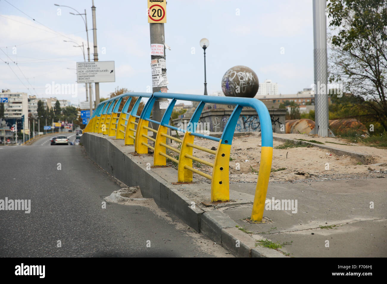 A fence is painted in the Ukrainian national colors in Kiev, Ukraine