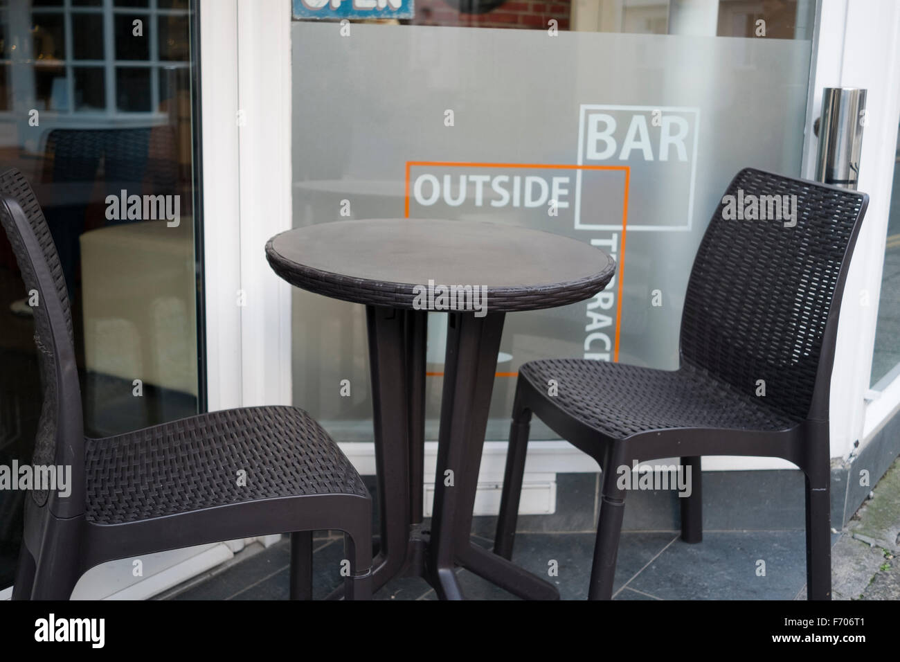 Table and chairs outside a cafe bar in Truro Stock Photo