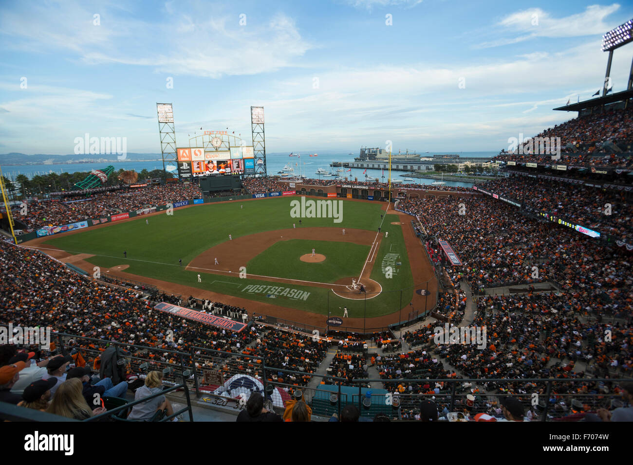San Francisco, California, USA, October 16, 2014, AT&T Park, baseball stadium, SF Giants versus St. Louis Cardinals, National League Championship Series (NLCS), crowd watches game elevated view Stock Photo