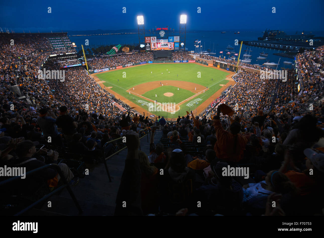 San Francisco, California, USA, October 16, 2014, AT&T Park, baseball stadium, SF Giants versus St. Louis Cardinals, National League Championship Series (NLCS), crowd watches game elevated view Stock Photo