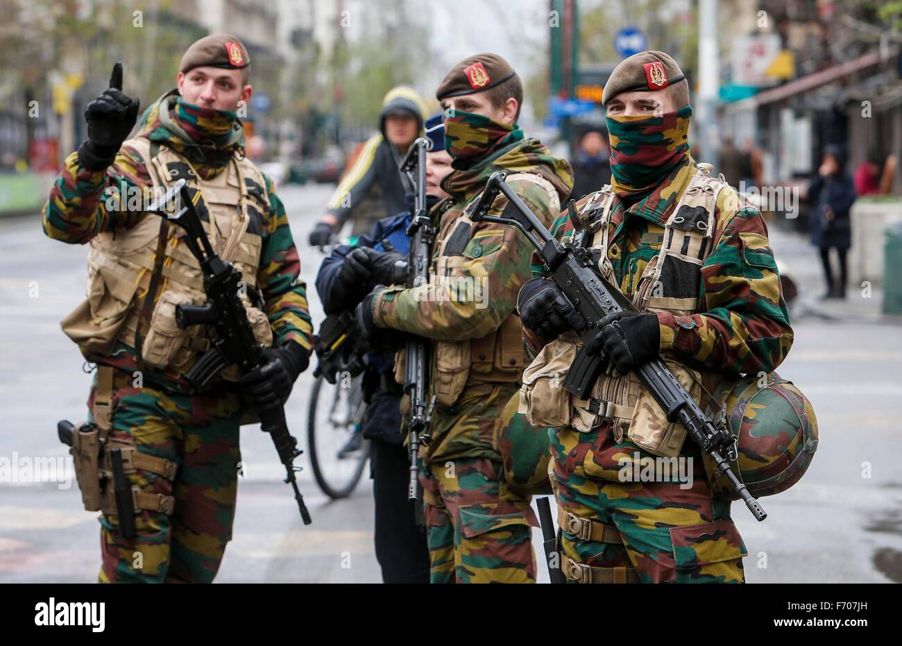 Brussels, Belgium. 22nd November, 2015. Belgian soldiers patrol in central Brussels, capital of Belgium, on Nov. 22, 2015. Belgian Prime Minister Charles Michel confirmed on Sunday evening that the level 4 of terror alert, the highest possible, for the Brussels region remained in place. He said the rest of Belgium remains on level 3, following a new assessment by OCAM, the Belgian Coordinating Body for Threat Analysis. 'I confirm that we fear there might be a similar attack to Paris,' said Charles Michel. Credit:  Xinhua/Alamy Live News Stock Photo
