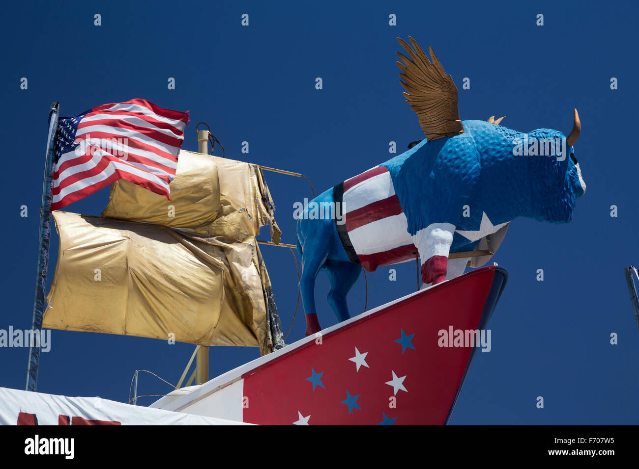 Arizona, Tucson, USA, April 8, 2015, roadside buffalo and US Flag on ship Stock Photo