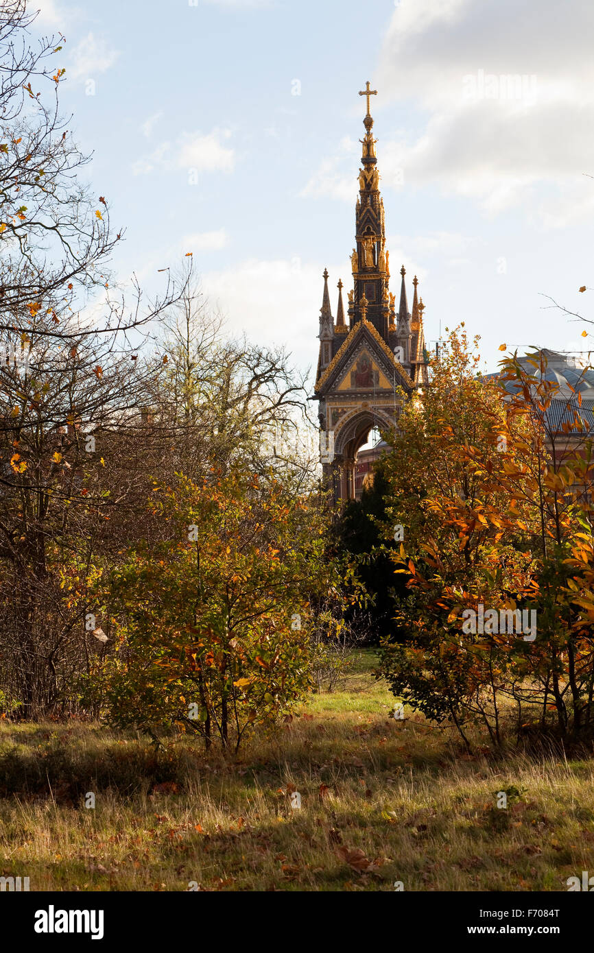 The last of the autumn light shines on the Prince Albert Memorial in inner London making the golden memorial glow. Stock Photo