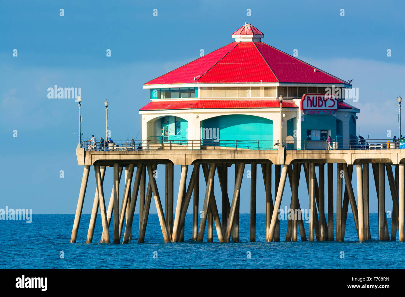 Huntington Beach, CA NOV 15th, 2015: Famous Ruby's restaurant on Huntington Beach pier with its classic bright red roof during a Stock Photo