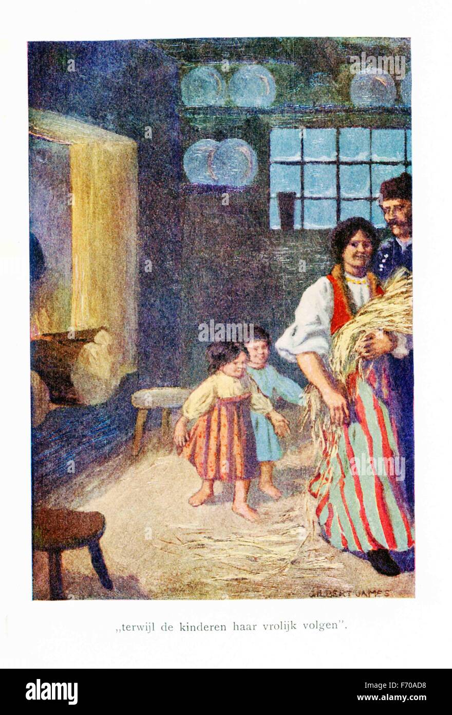 The caption for this illustration reads: While the children follow her gaily. The scene here is Christmas time, the day before Christmas, when a bundle of straw is strewn across the floor. The straw represents Jesus Christ's humble birth. The illustration is from a 1921 book on Serbian myths and legends. Stock Photo