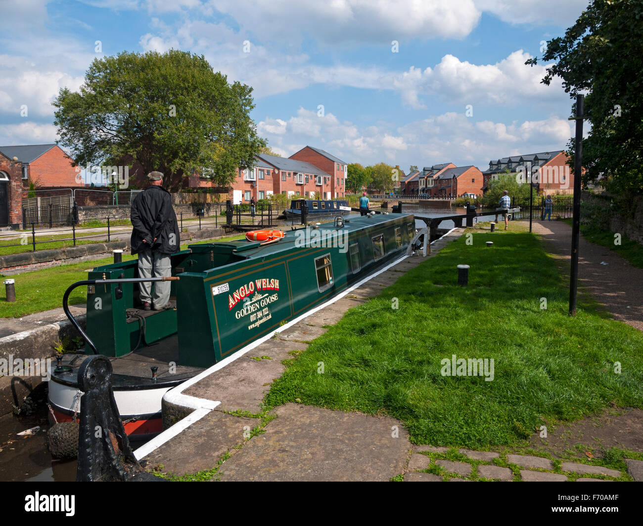 A narrowboat on the Ashton canal at Fairfield Locks, Droylsden, Tameside, Manchester, England, UK Stock Photo