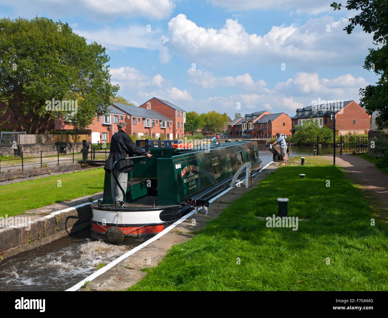 A narrowboat on the Ashton canal at Fairfield Locks, Droylsden, Tameside, Manchester, England, UK Stock Photo