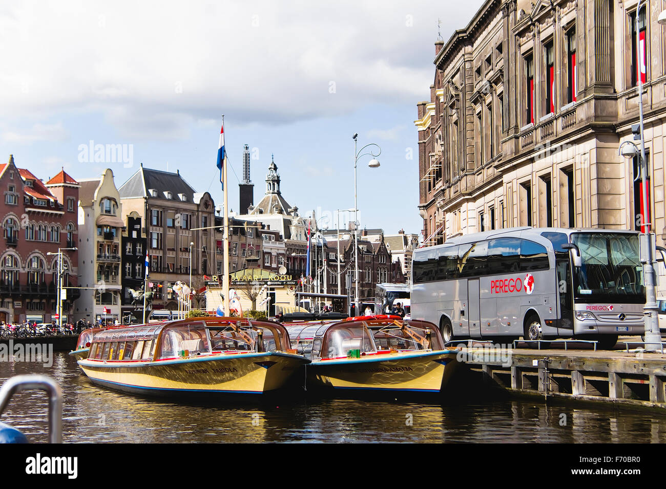 Image of Glass topped tourist canal boats in Amsterdam Stock Photo