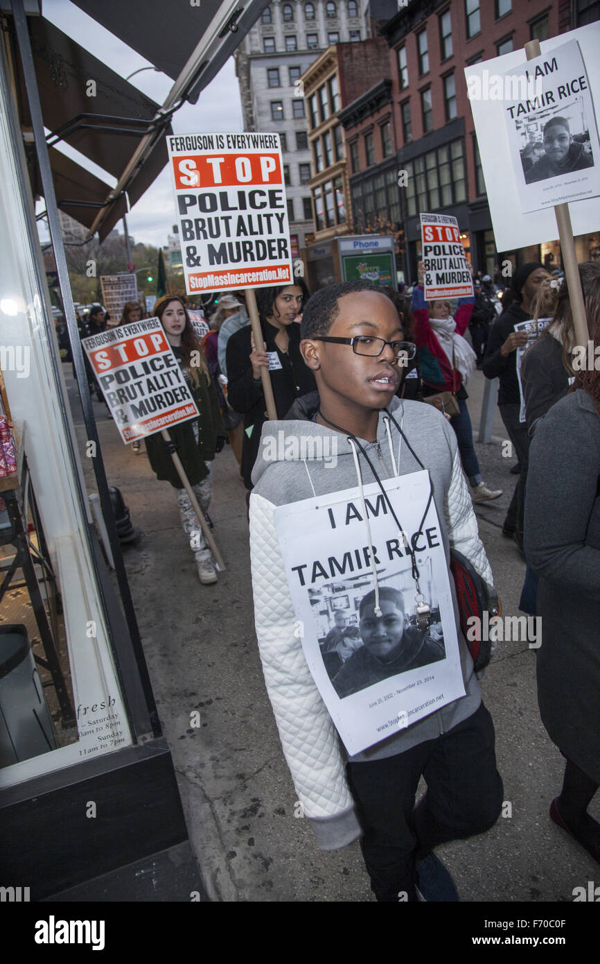 New York, USA. 22nd November, 2015. Children's March to bring more attention to police shootings of children on the 1 year anniversary of the killing by police of 12 yr. old Tamir Rice in Cleveland, Ohio. He had a toy gun. Police have not yet been charged with anything one year after the incident. Credit:  David Grossman/Alamy Live News Stock Photo
