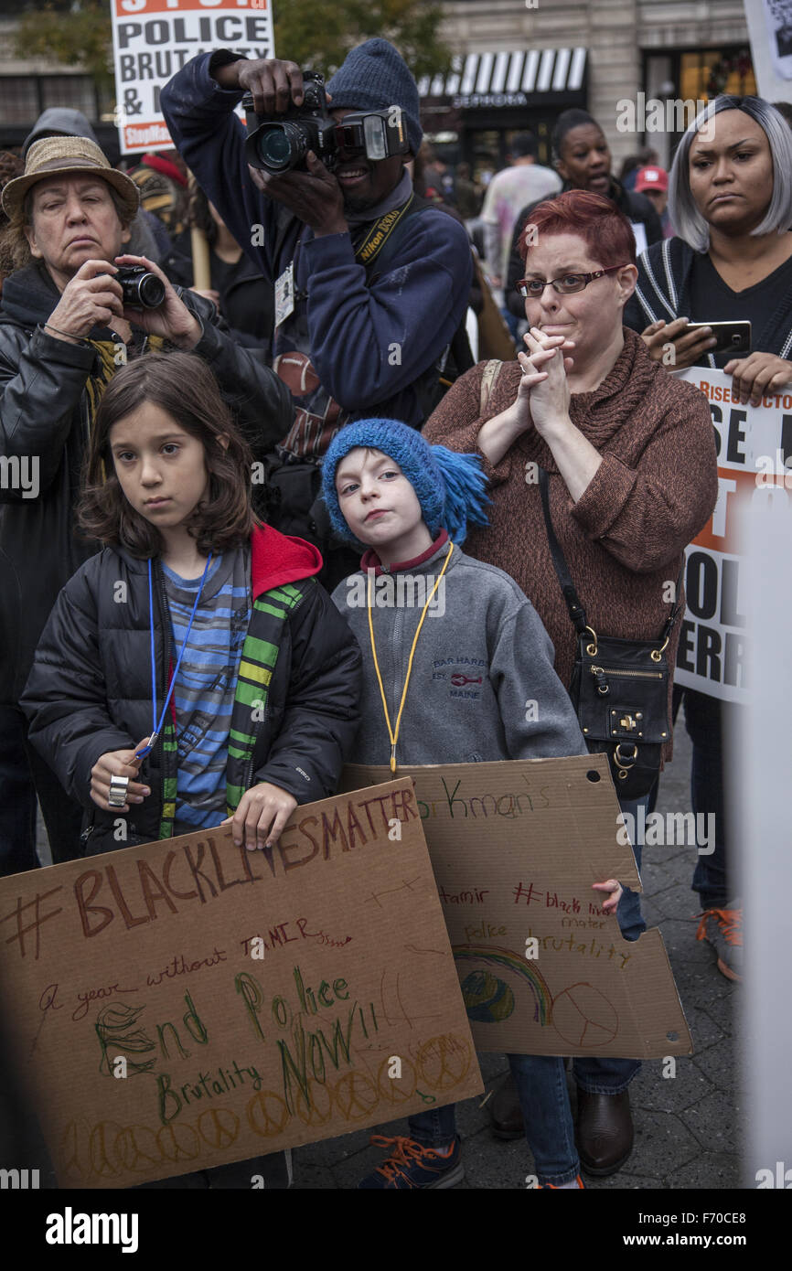 New York, USA. 22nd November, 2015. Children's March to bring more attention to police shootings of children on the 1 year anniversary of the killing by police of 12 yr. old Tamir Rice in Cleveland, Ohio. He had a toy gun. Police have not yet been charged with anything one year after the incident. Credit: David Grossman/Alamy Live News Stock Photo