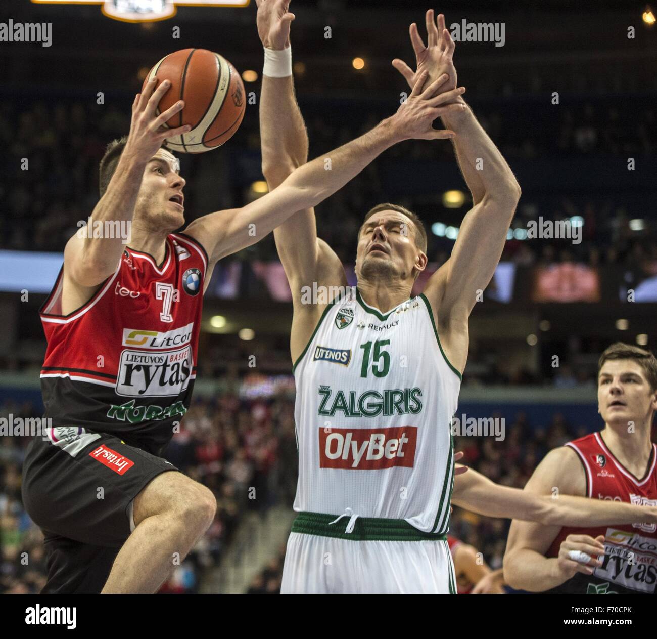Vilnius, Lithuania. 22nd Nov, 2015. Adas Juskevicius (L) of Lietuvos rytas  goes to the basket in a match against Zalgiris during the Lithuanian  Basketball League match in Vilnius, Lithuania, Nov. 22, 2015.