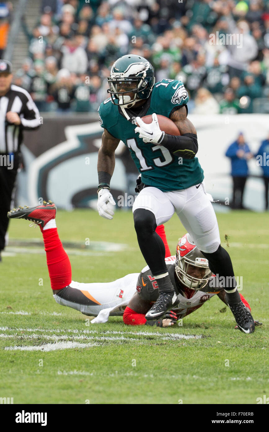 Philadelphia, Pennsylvania, USA. 22nd Nov, 2015. Philadelphia Eagles wide receiver Josh Huff (13) runs with the ball for a touchdown as he gets away from Tampa Bay Buccaneers defensive end Jacquies Smith (56) during the NFL game between the Tampa Bay Buccaneers and the Philadelphia Eagles at Lincoln Financial Field in Philadelphia, Pennsylvania. The Tampa Bay Buccaneers won 45-17. Christopher Szagola/CSM/Alamy Live News Stock Photo