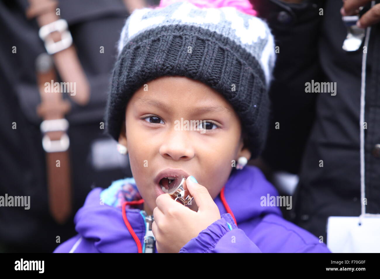 New York City, United States. 22nd Nov, 2015. Young activist practices her whistle. Stop Mass Incarcerations Network sponsored a children's march demanding accountability on the one year anniversary of Tamir Rice's death at the hands of the Cleveland police. © Andy Katz/Pacific Press/Alamy Live News Stock Photo