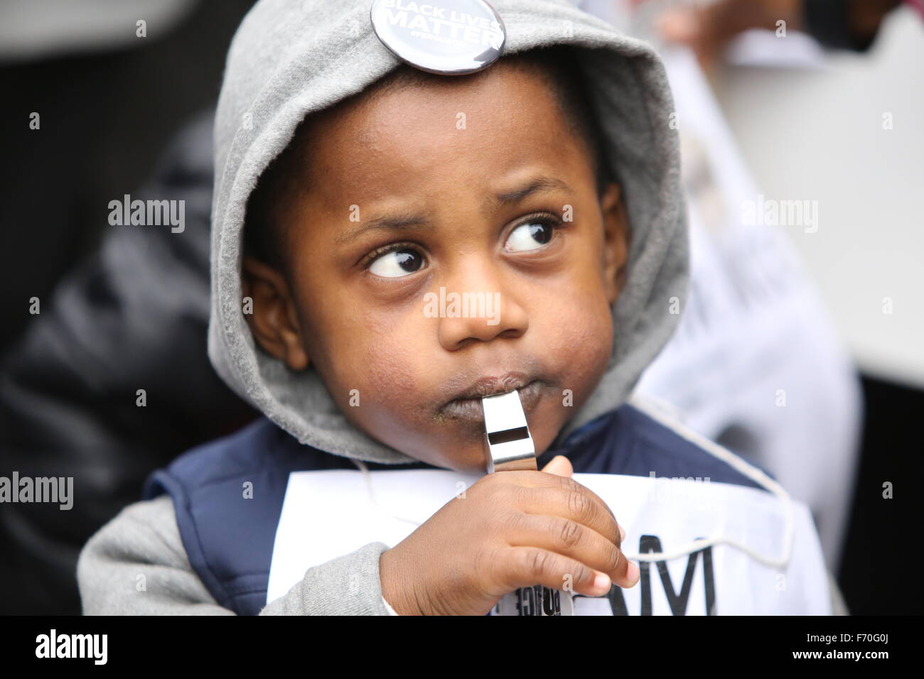 New York City, United States. 22nd Nov, 2015. Young activist with whistle. Stop Mass Incarcerations Network sponsored a children's march demanding accountability on the one year anniversary of Tamir Rice's death at the hands of the Cleveland police. © Andy Katz/Pacific Press/Alamy Live News Stock Photo