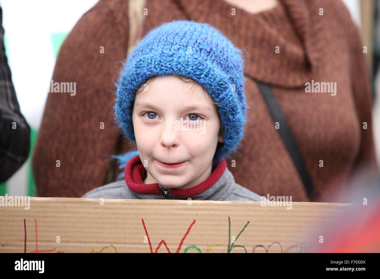 New York City, United States. 22nd Nov, 2015. Young activist with cardboard sign. Stop Mass Incarcerations Network sponsored a children's march demanding accountability on the one year anniversary of Tamir Rice's death at the hands of the Cleveland police. © Andy Katz/Pacific Press/Alamy Live News Stock Photo