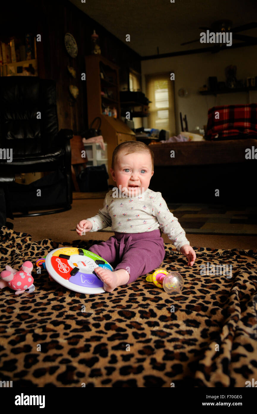 6 month old baby crying Stock Photo