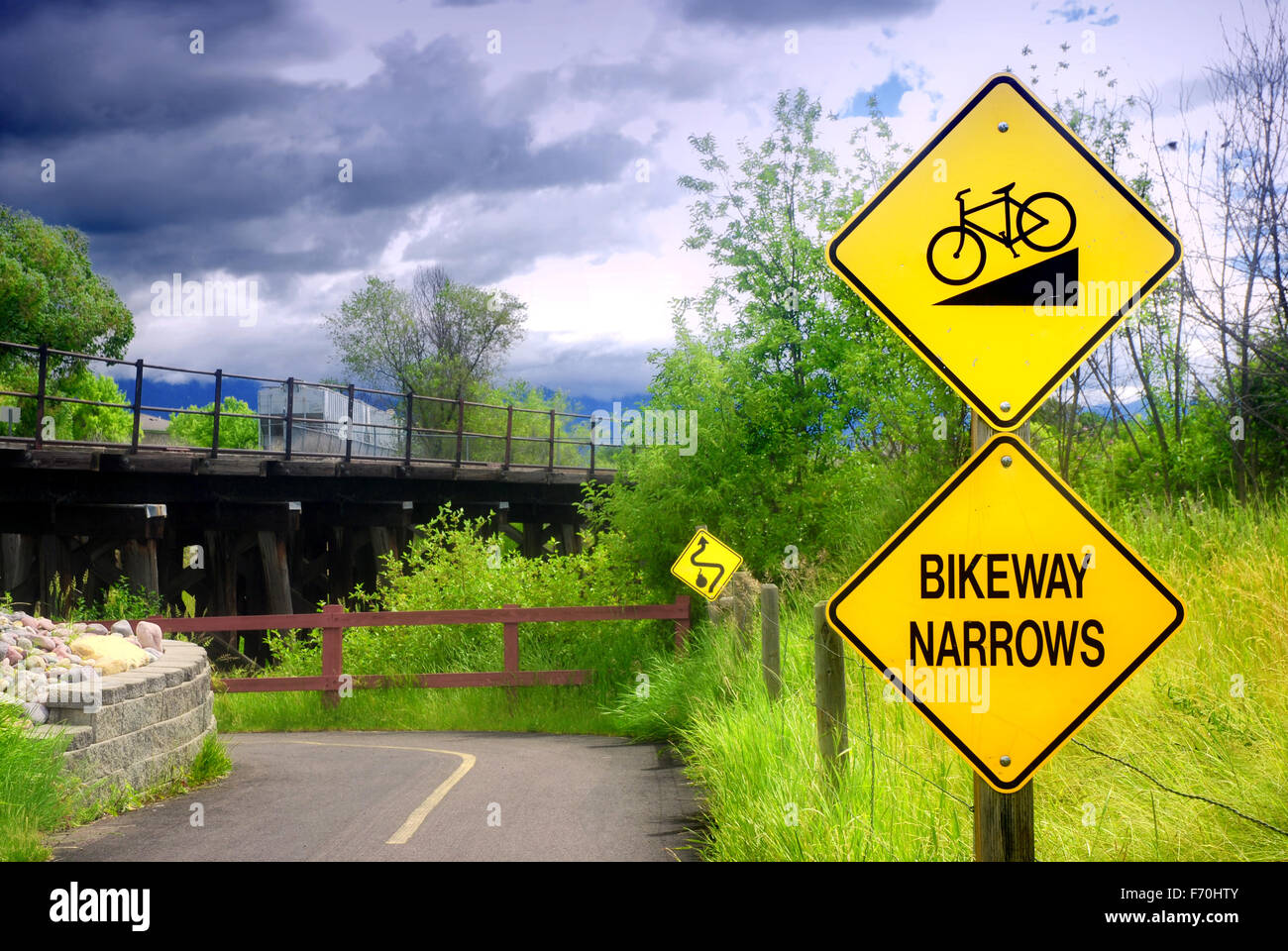 Bikeway narrows sign on bike path in Kalispell, Montana Stock Photo Alamy