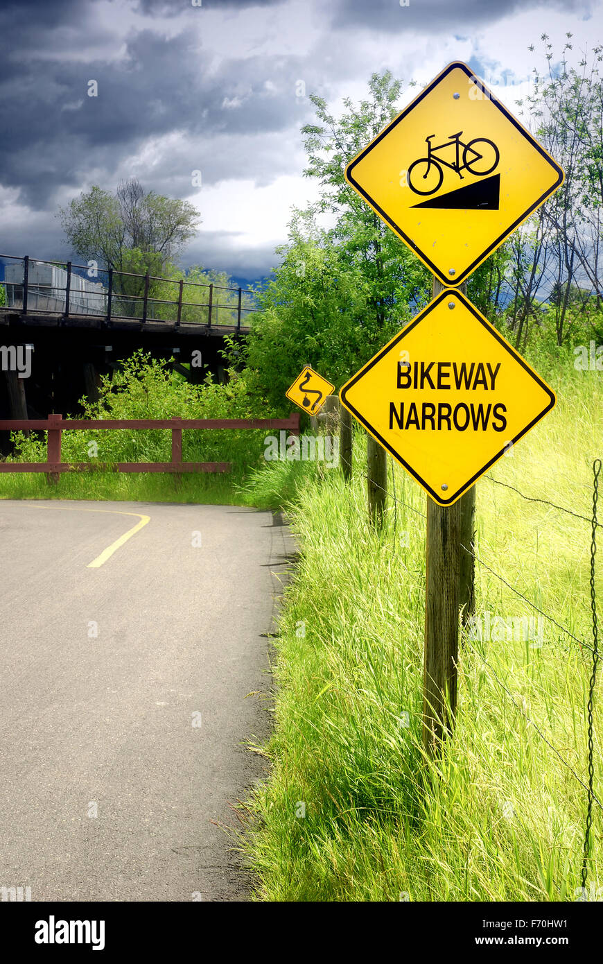 Bikeway narrows sign on bike path in Kalispell, Montana Stock Photo