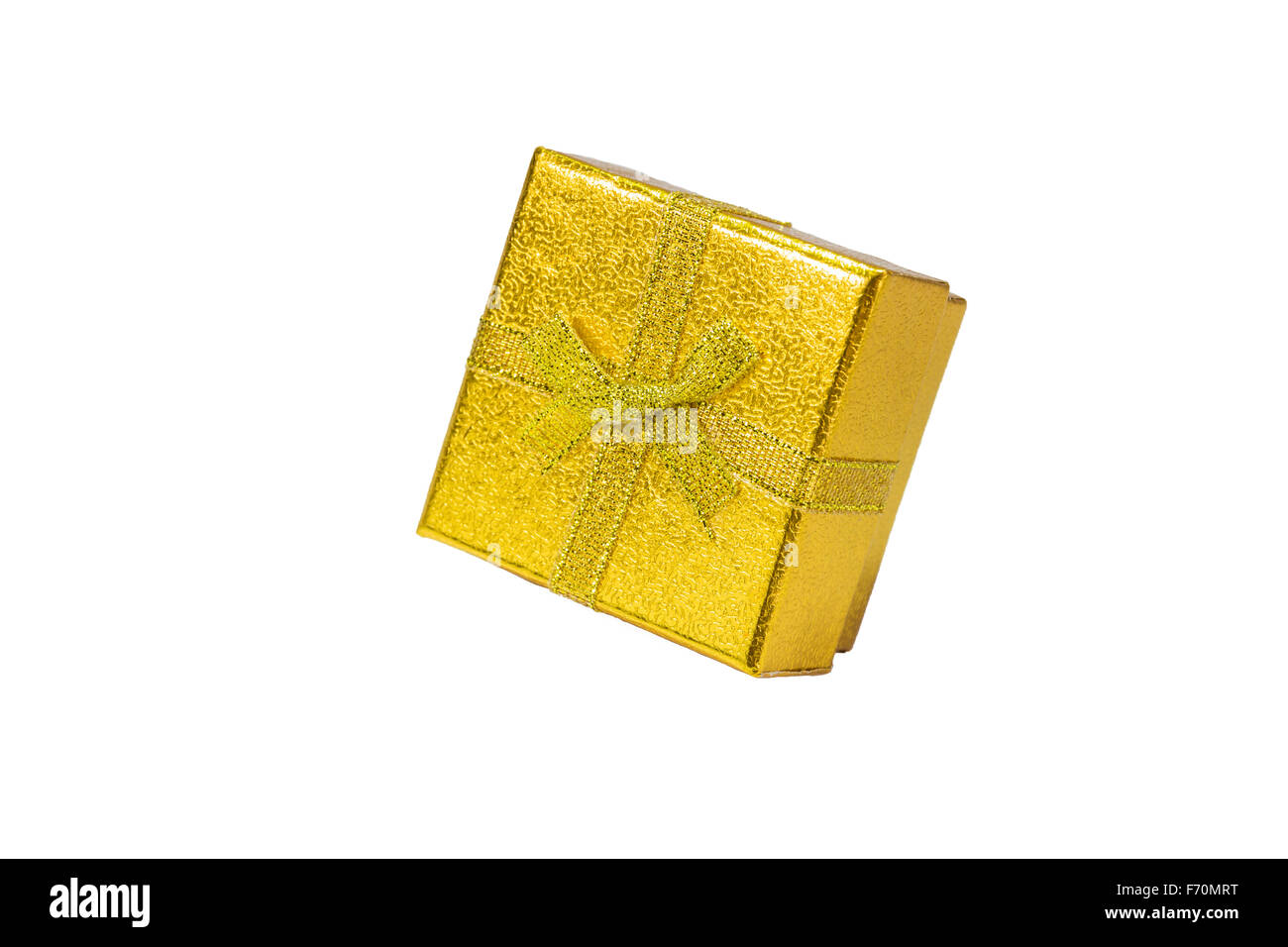 Golden gift box with golden ribbon on white background Stock Photo - Alamy