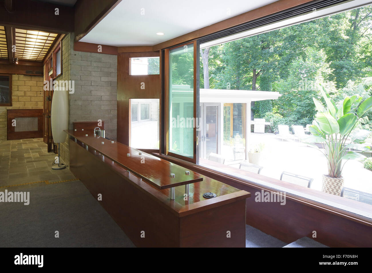 Indoor/outdoor bar in family room. Usonia, Town of Mt. Pleasant, United States. Architect Frank