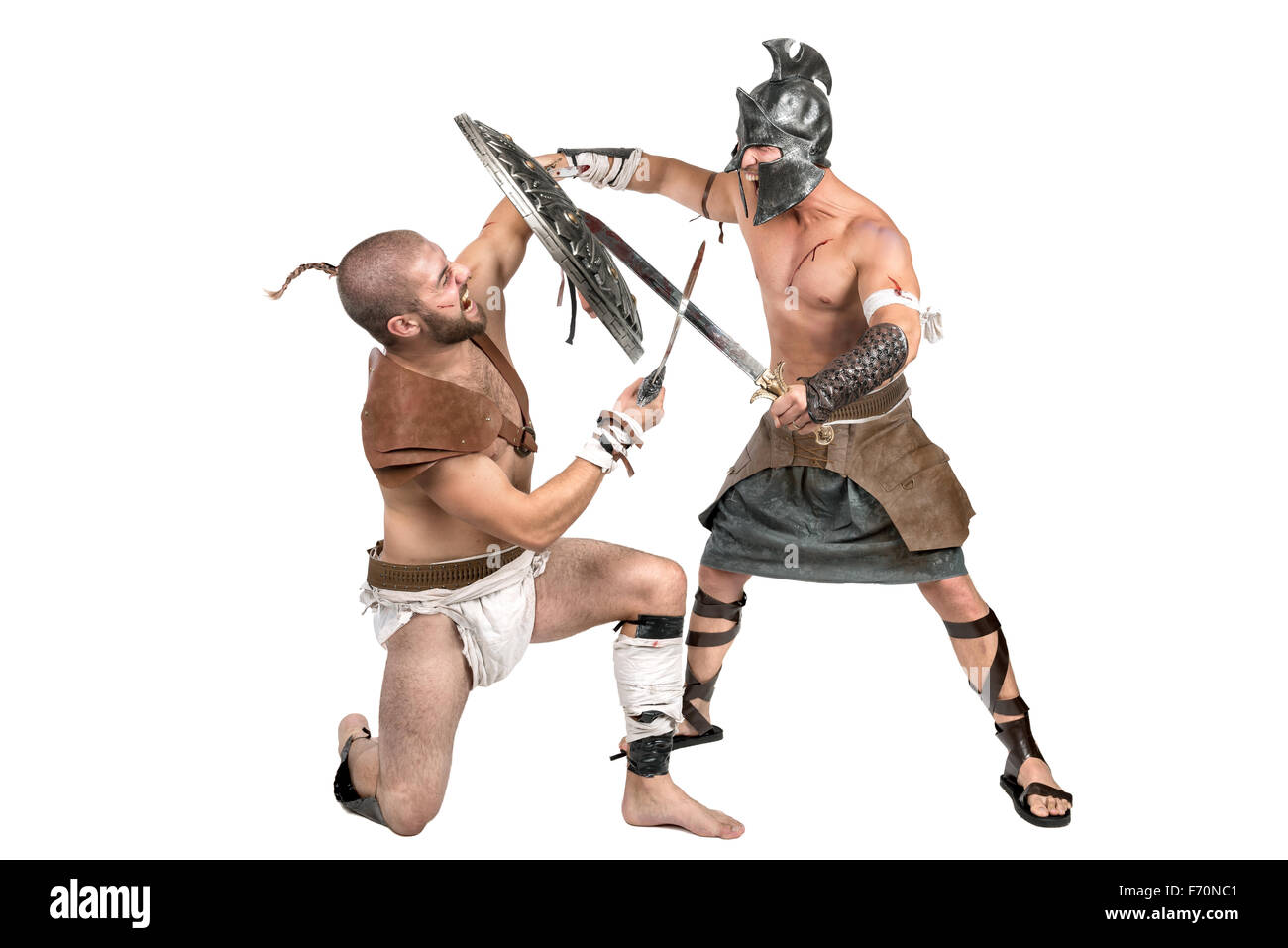 Gladiators fighting isolated in a white background Stock Photo